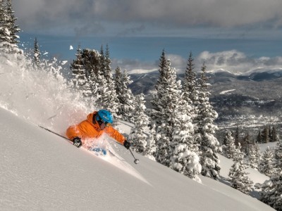 Breckenridge skiier in heavy powder